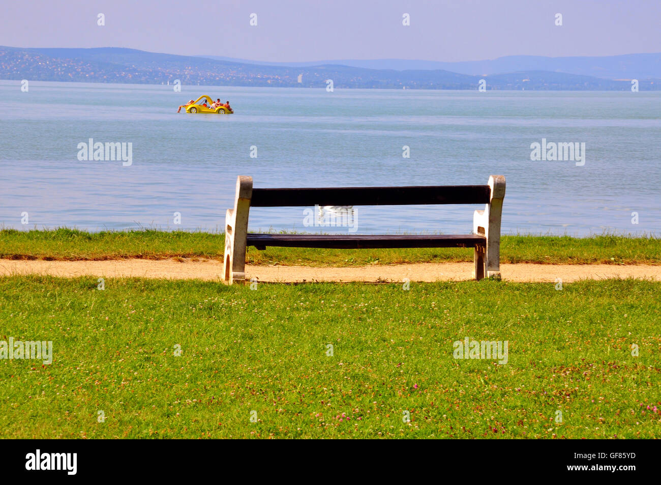 Bench at the water, Siofok, Hungary Stock Photo