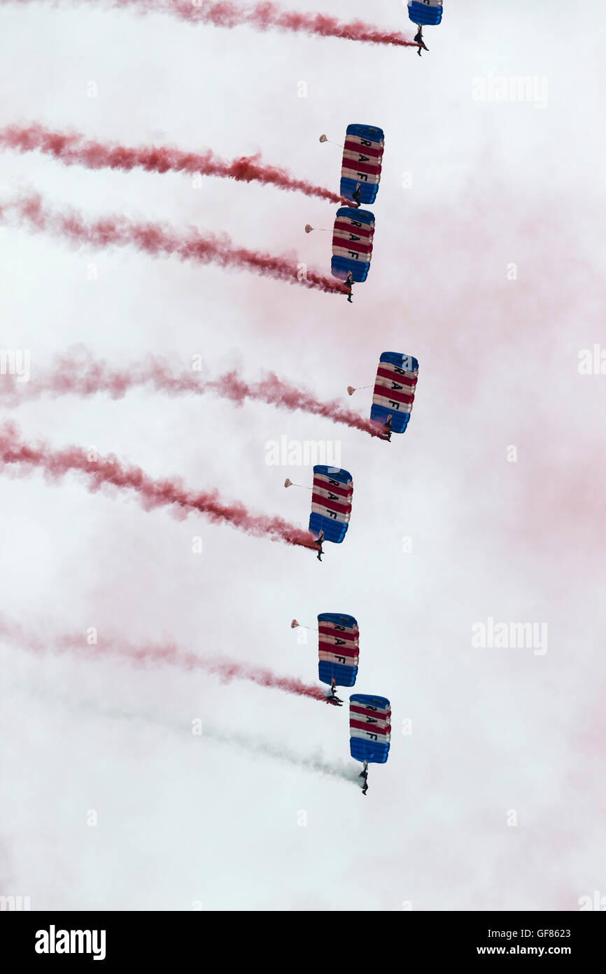 The RAF Falcons parachute display team descend from the sky as a stack at the 2016 Jaeger Le Coultre Gold Cup final at Cowdray Stock Photo