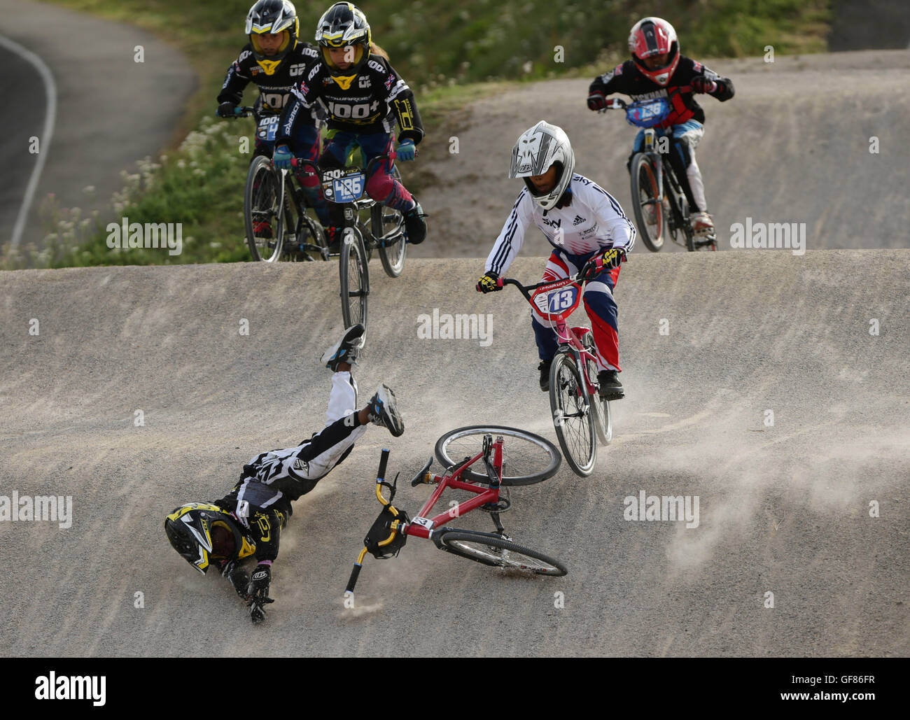 A competitor crashes her bike during a BMX race at the Prudential RideLondon Grand Prix at the