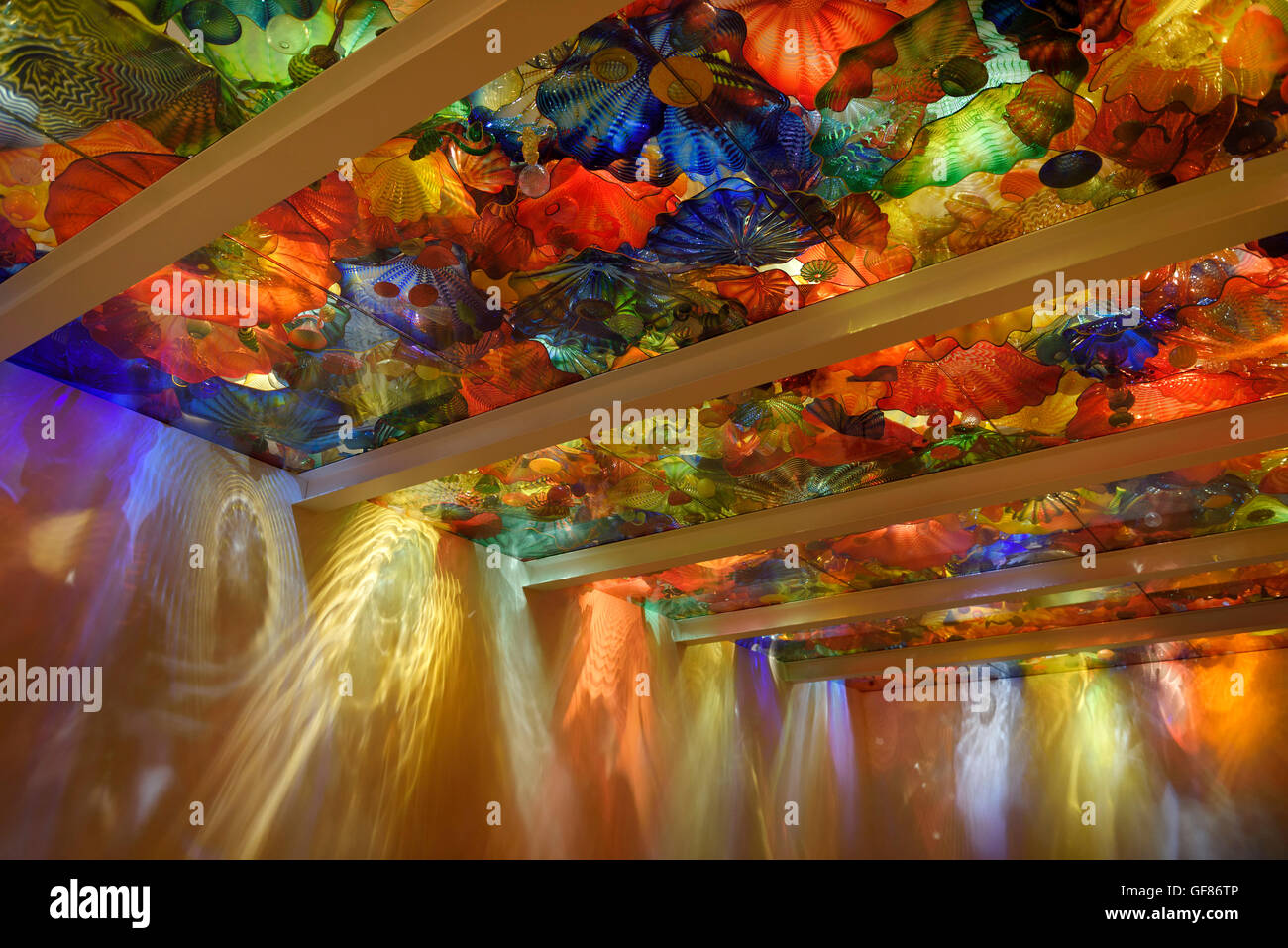 Light patterns in room with plate glass ceiling of Chihuly art ROM Toronto Stock Photo
