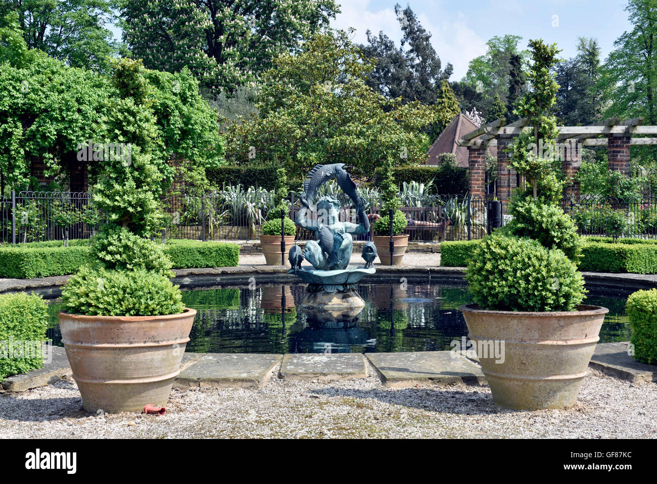 Ornamental pond with statue and box topiary, Golders Hill Park, Golders