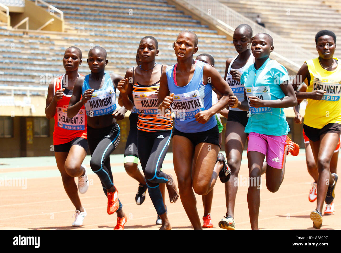 Ugandan athletes racing during the national trials at Mandela stadium, in Kampala Stock Photo