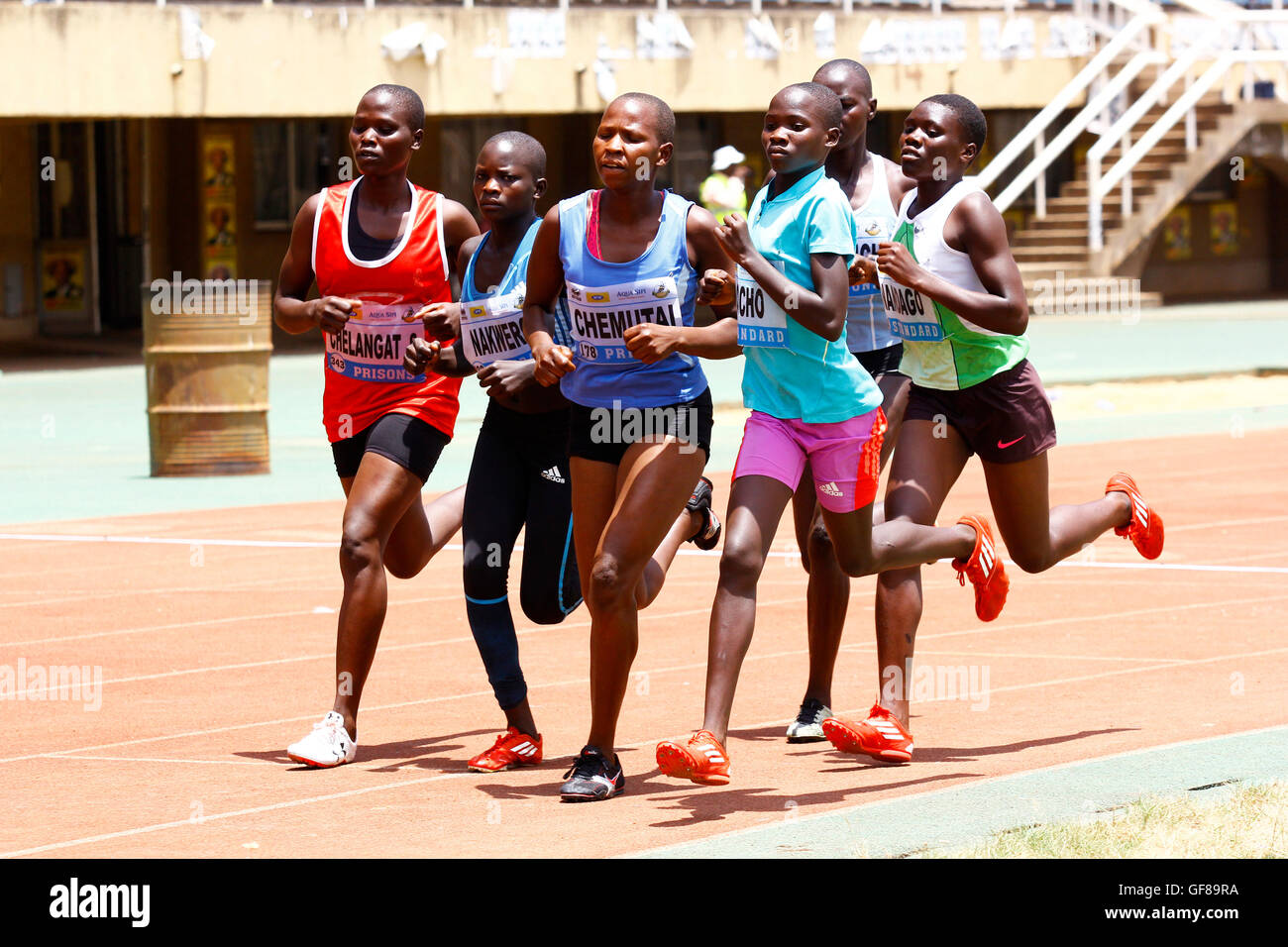 Ugandan athletes racing during the national trials at Mandela stadium, in Kampala Stock Photo