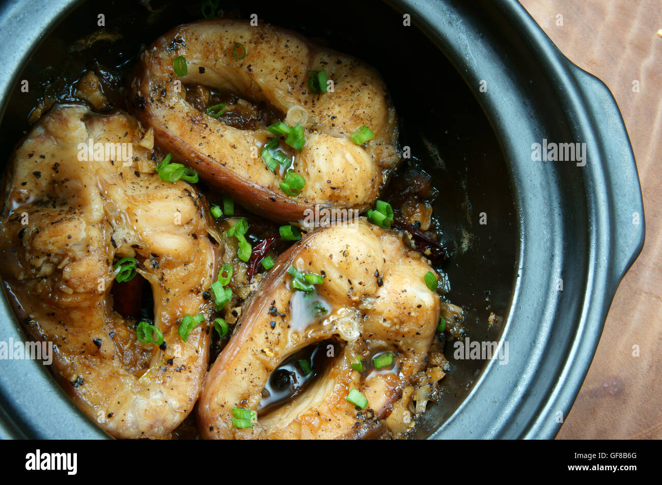 Kho Filefish Vietnamese food, ca kho to or fish cook with sauce Stock Photo - Alamy