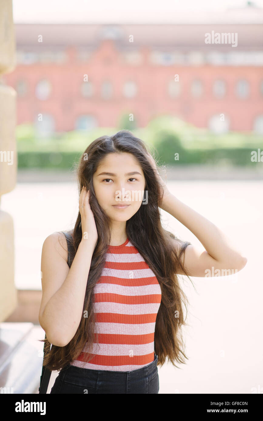 Portrait of Young Asian woman. Young woman on city background with