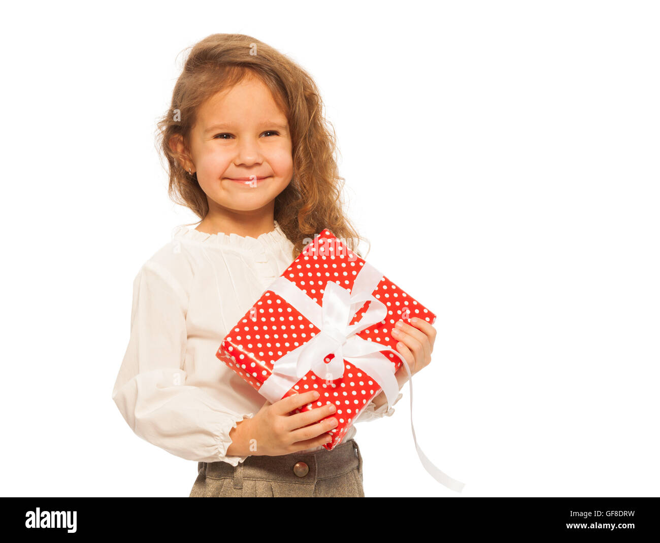 Happy smiling girl with little red present Stock Photo - Alamy