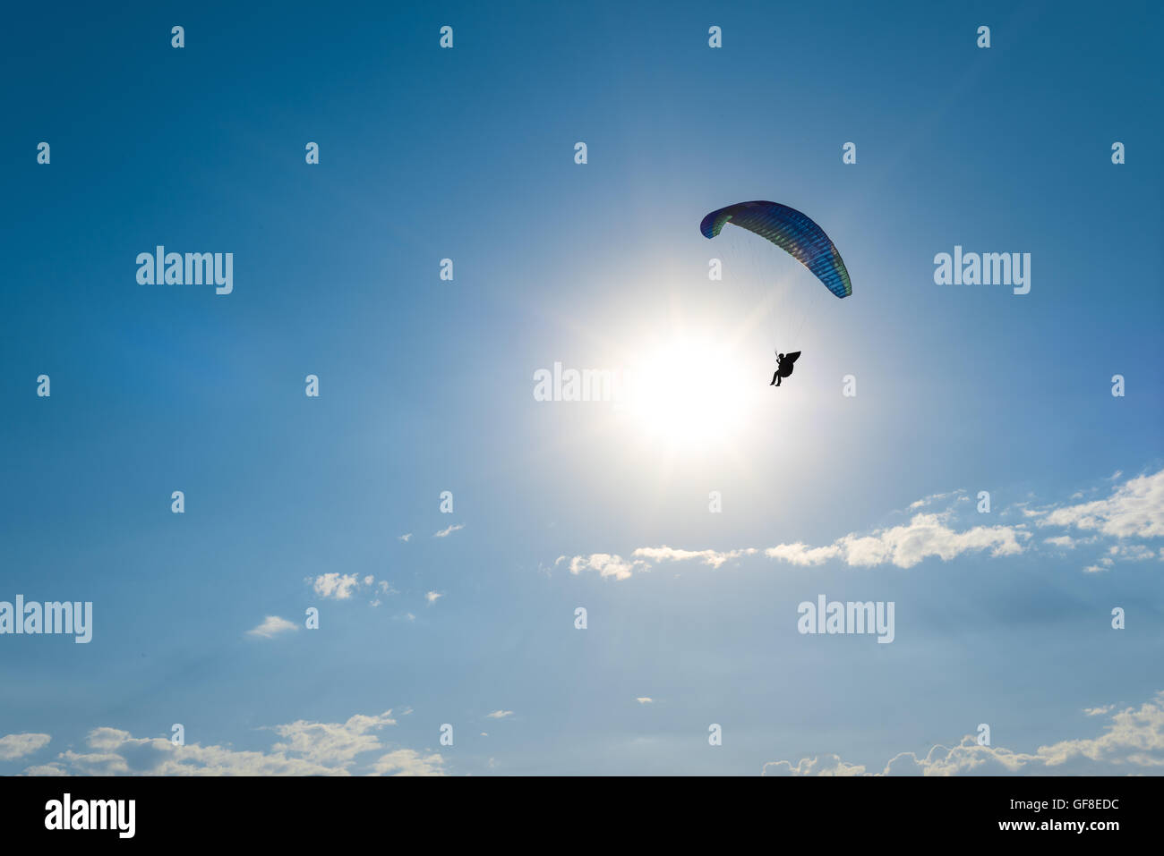 Paragliding in the sky Stock Photo