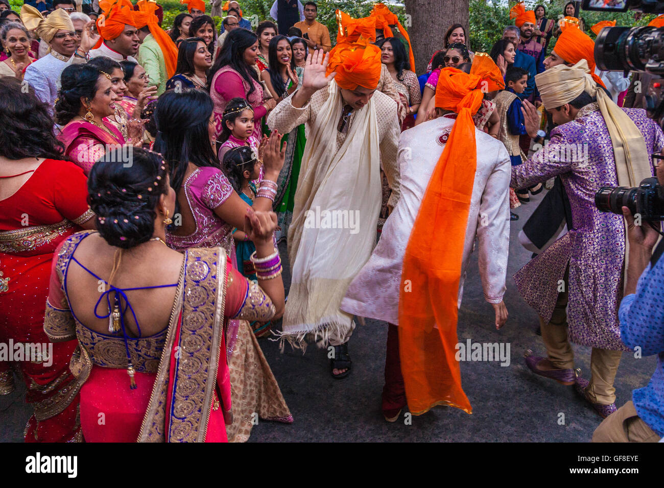 Indians dancing the Bhangra at a wedding reception in Rajasthan Stock Photo
