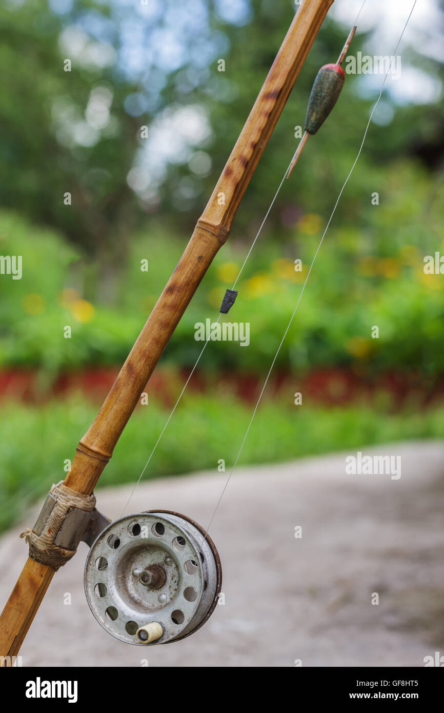 Old bamboo rod to catch fish Stock Photo - Alamy