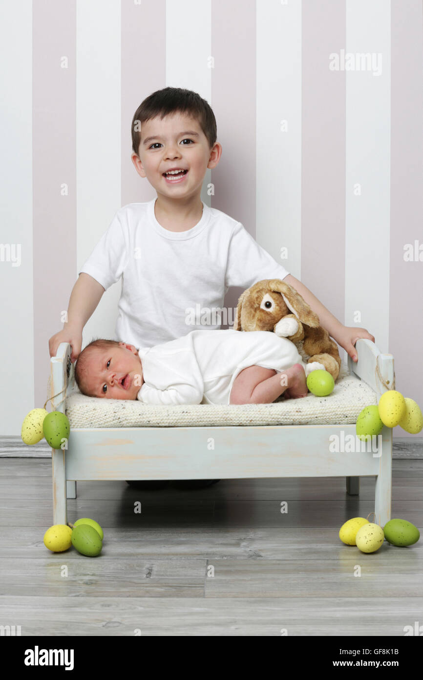 Newborn baby with brother Stock Photo