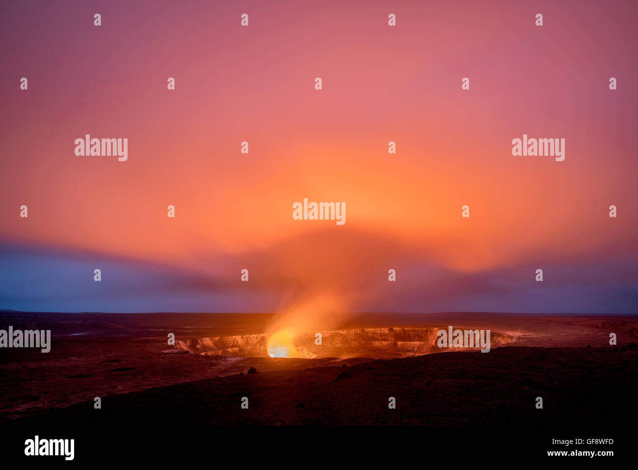 Halema‘uma‘u crater on Kīlauea volcano glows at evening. Hawaii Island. Stock Photo