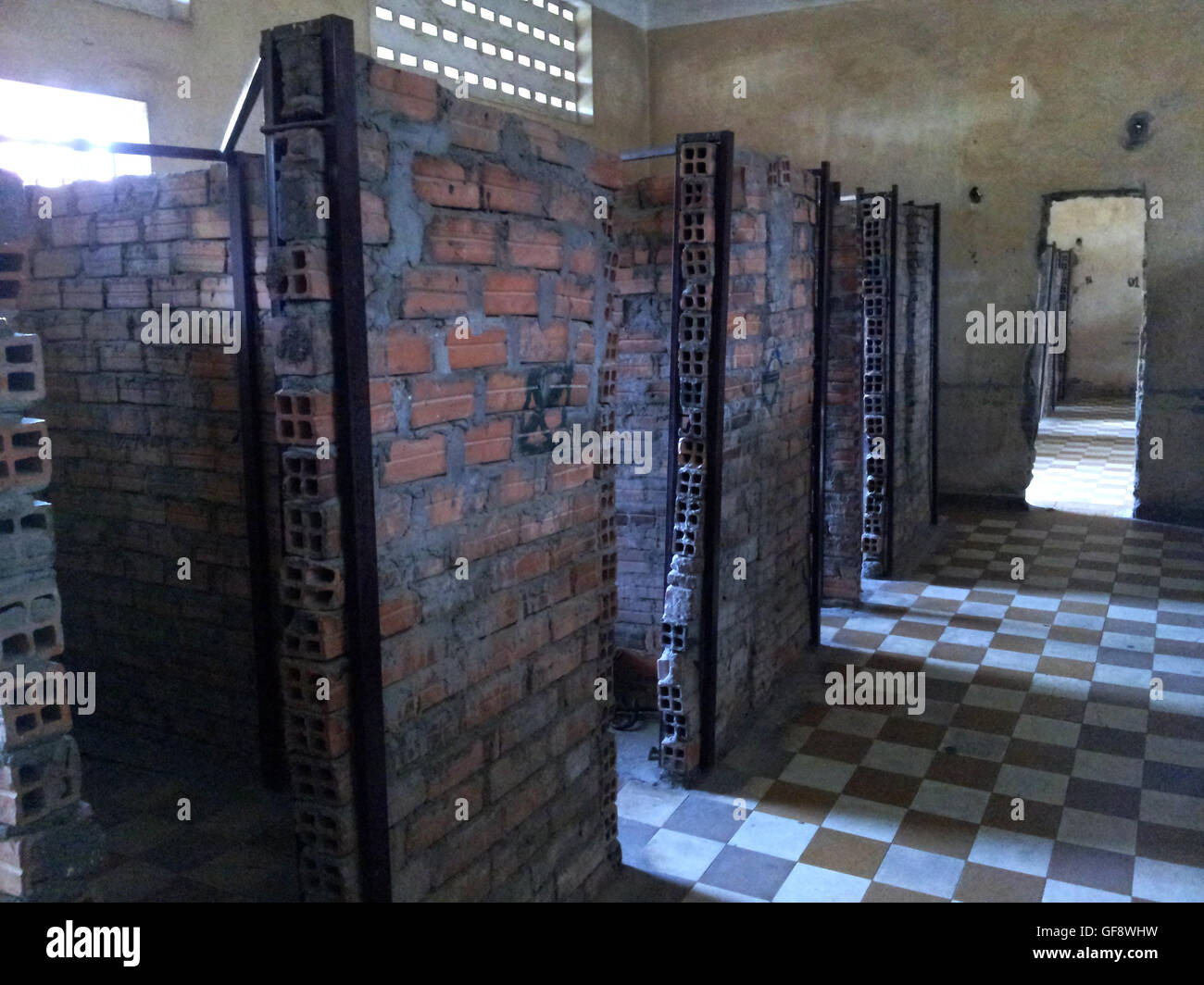 S21, Where people were murdered on a massive scale by the Pol Pot Regime..this is a room with cells where people were tortured . Stock Photo