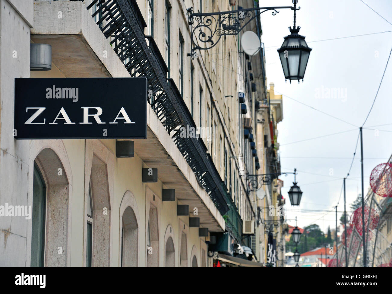 Lisbon, Portugal - December 25, 2013: Zara store sign on the grey building on Agusta street in Baixa district of Lisbon on Decem Stock Photo