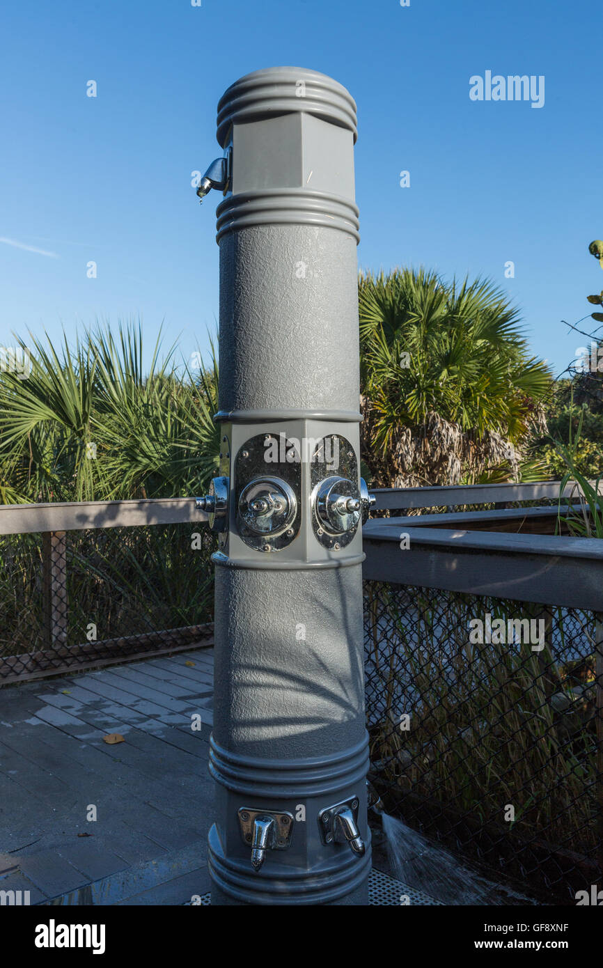 Public free cold water machineon wooden path to the beach, Florida Stock Photo