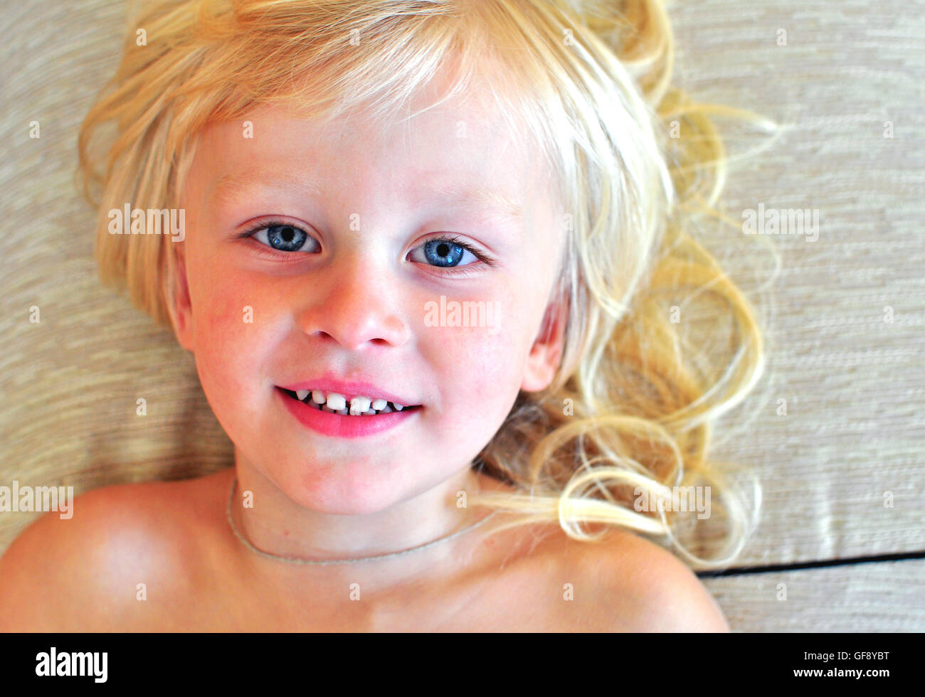 Cute little boy with blonde hair Stock Photo - Alamy