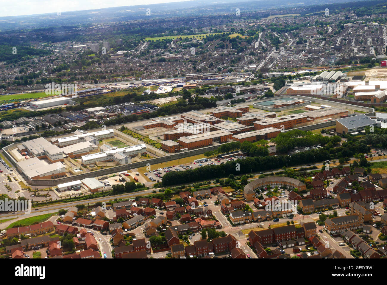 HM Prison Belmarsh, a category A mens prison in Thamesmeade, south east London from aeropane landing at City Airport Stock Photo