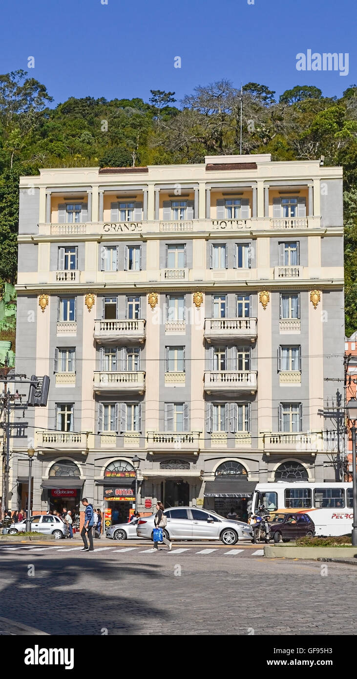 Fornt view of the Grand Hotel in Petropolis, Rio de Janeiro, Brazil, during the day, showing traffic and people Stock Photo