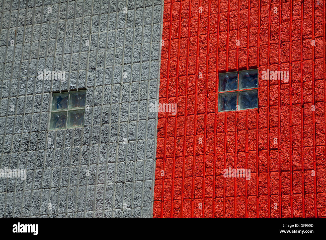 Windows on red and grey wall, Venice Beach, California, USA Stock Photo