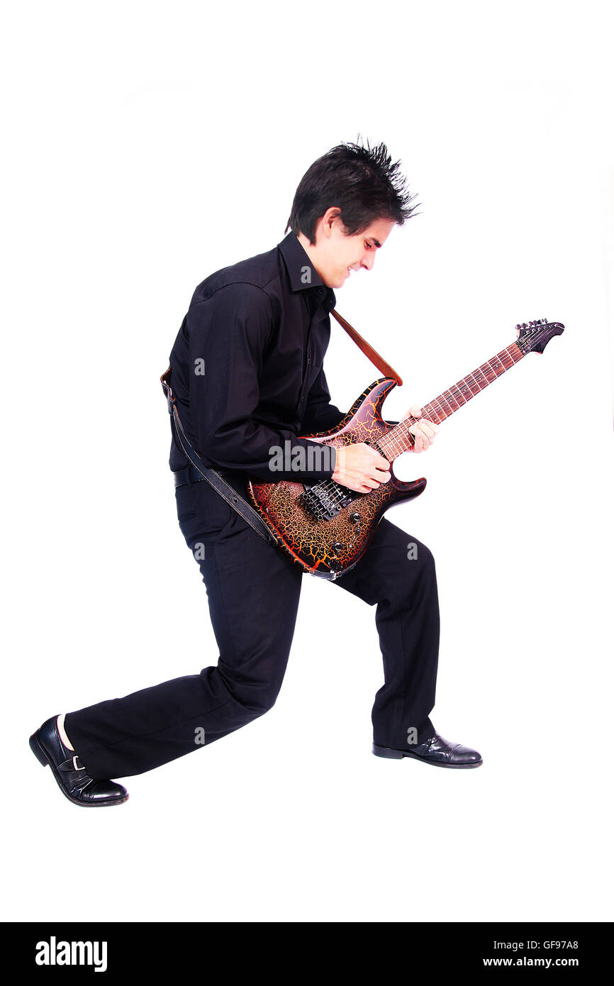 A male guitarrist in action in white background Stock Photo