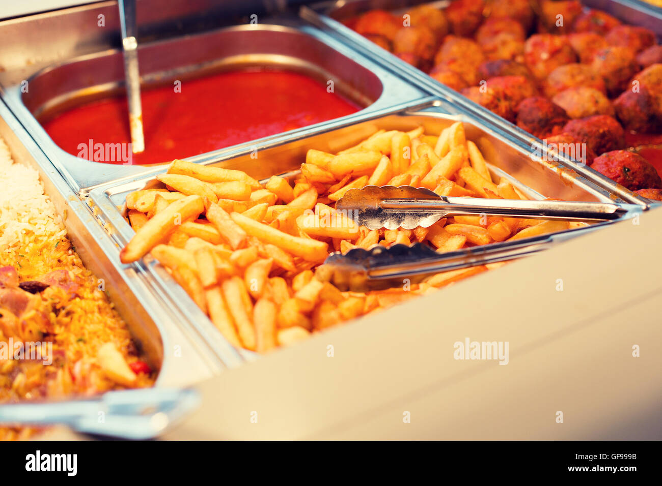 close up french fries of and other dishes on tray Stock Photo