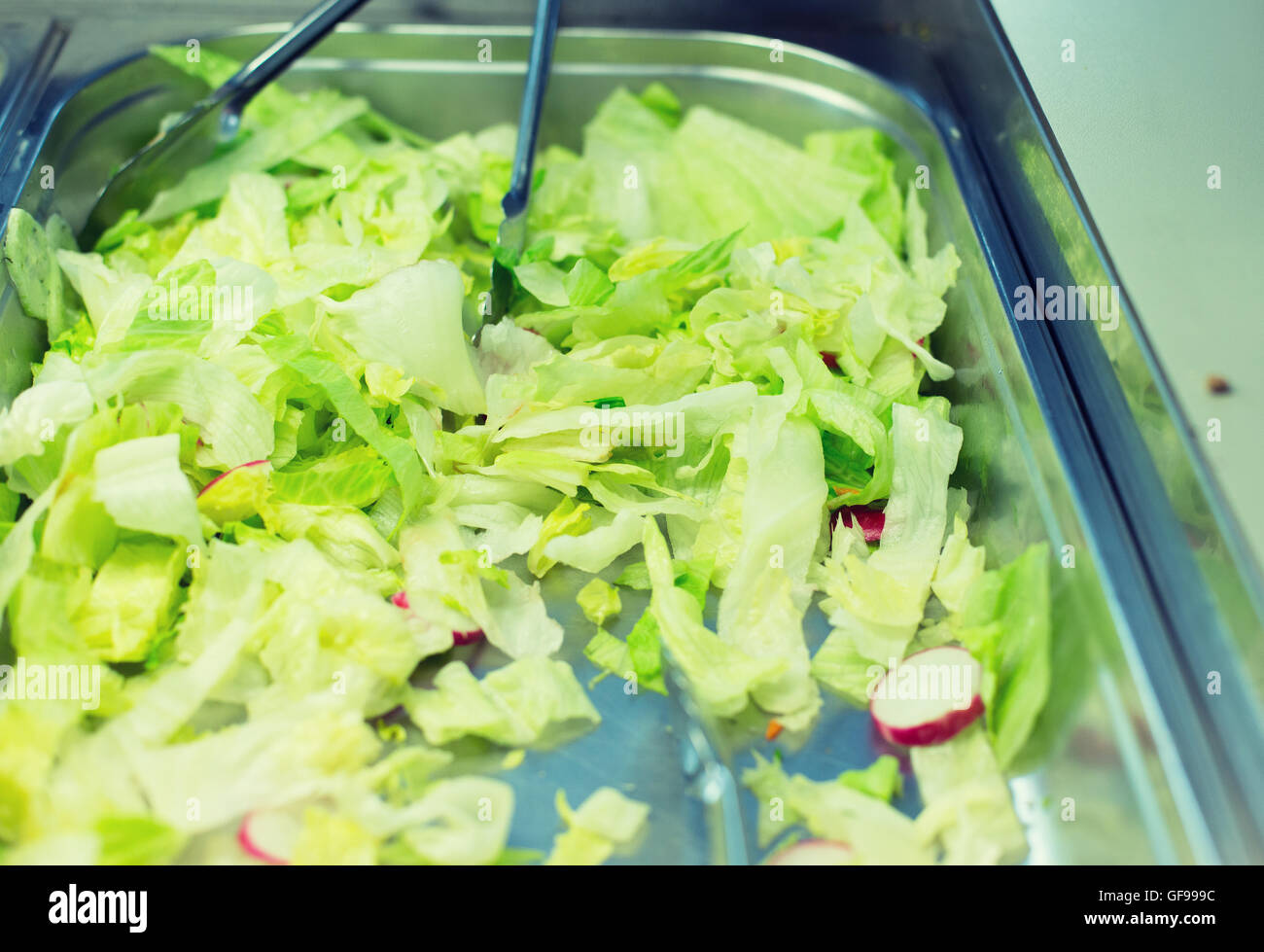 close up of romaine lettuce salad in container Stock Photo