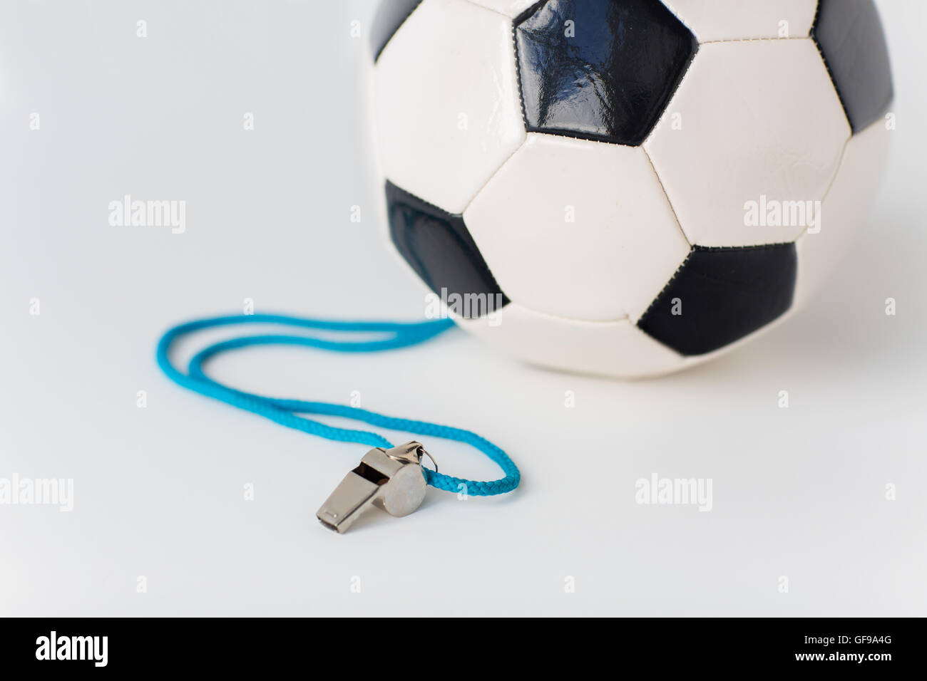 close up of football or soccer ball and whistle Stock Photo Alamy
