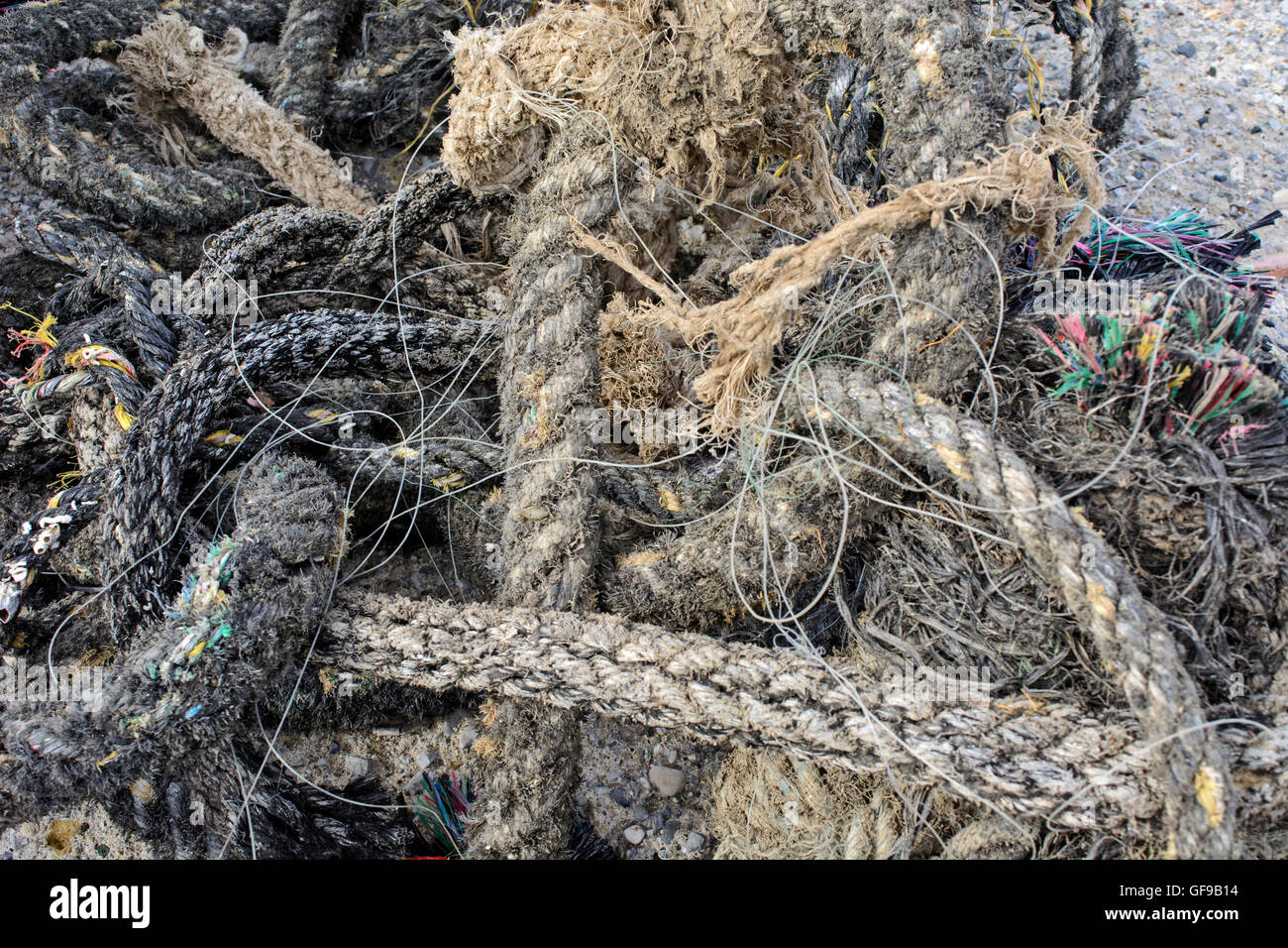 The ball of the old marine rope in the harbor Stock Photo - Alamy