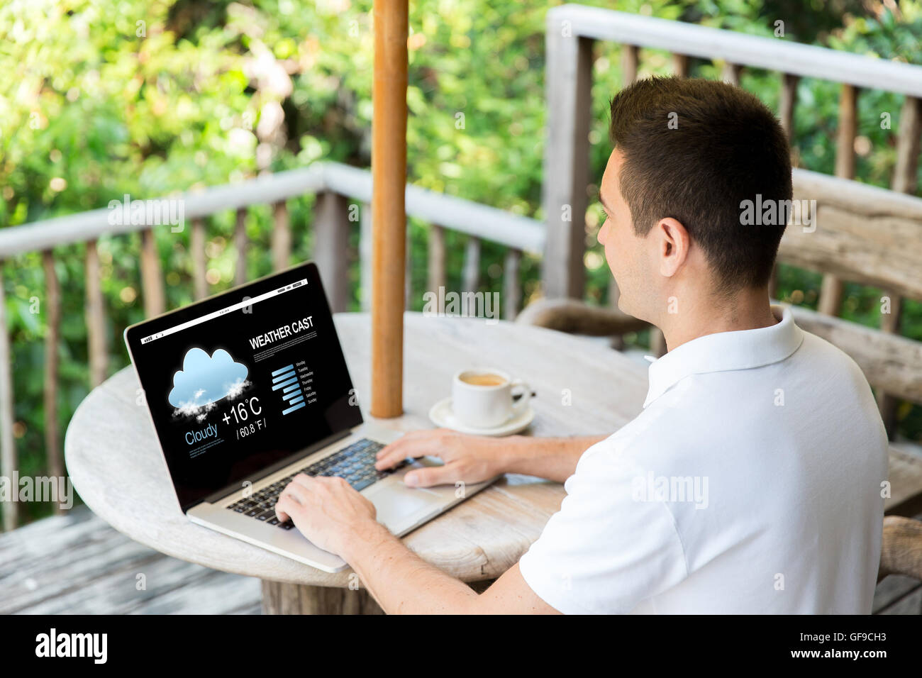 close up of businessman with laptop on terrace Stock Photo