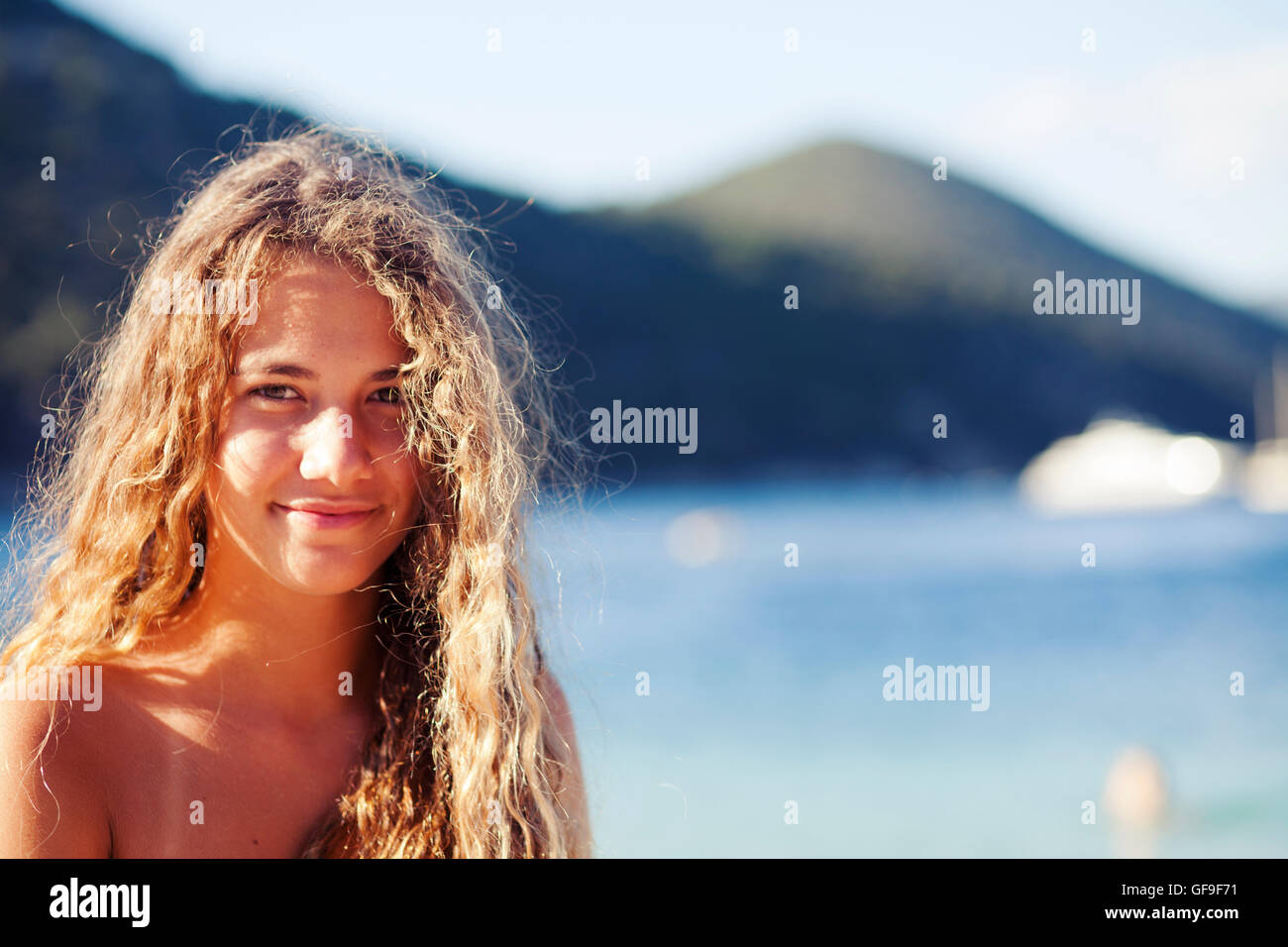 Young beautiful woman at the seaside. Antisamos beach, Kefalonia, Ionian Islands, Greece Stock Photo