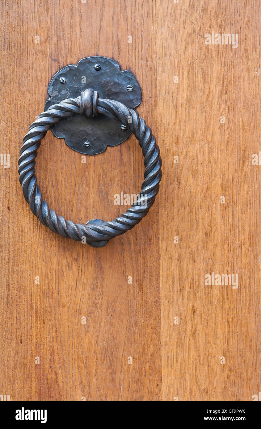 Door Metal Ringing String A metal ring as a door knocker on a wooden door Stock Photo - Alamy