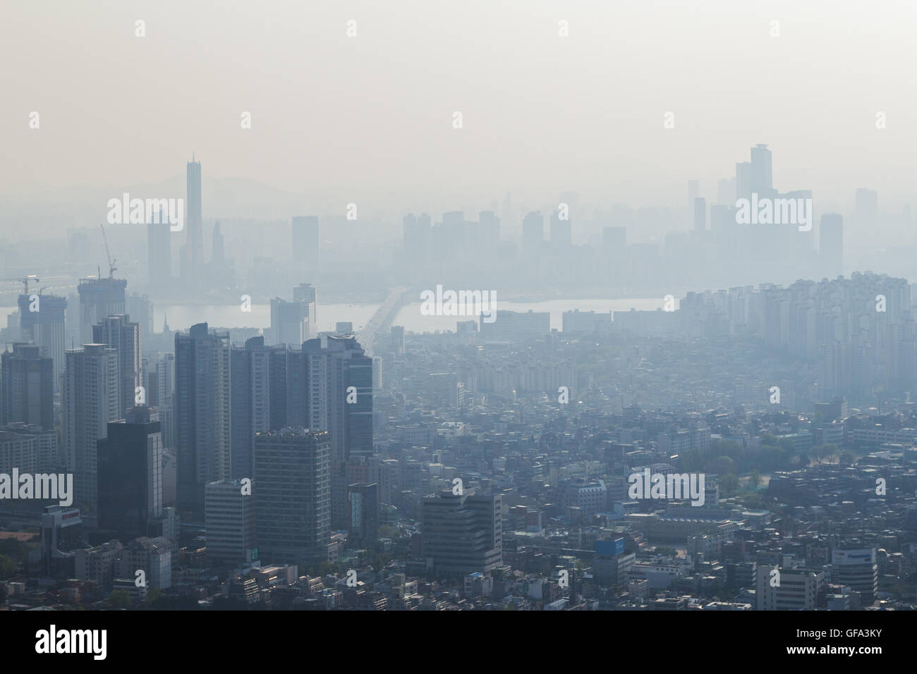View of downtown in Seoul, South Korea, with serious air pollution. Stock Photo