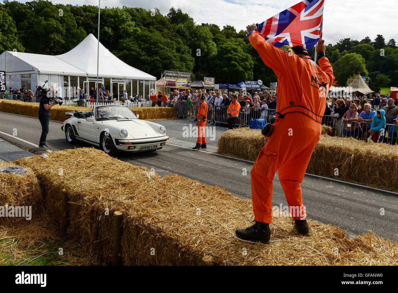 Carfest North, Bolesworth, Cheshire, UK. 30th July 2016. A Porsche at the start of the track sprint. The event is the brainchild of Chris Evans and features 3 days of cars, music and entertainment with profits being donated to the charity Children in Need. Andrew Paterson/Alamy Live News Stock Photo