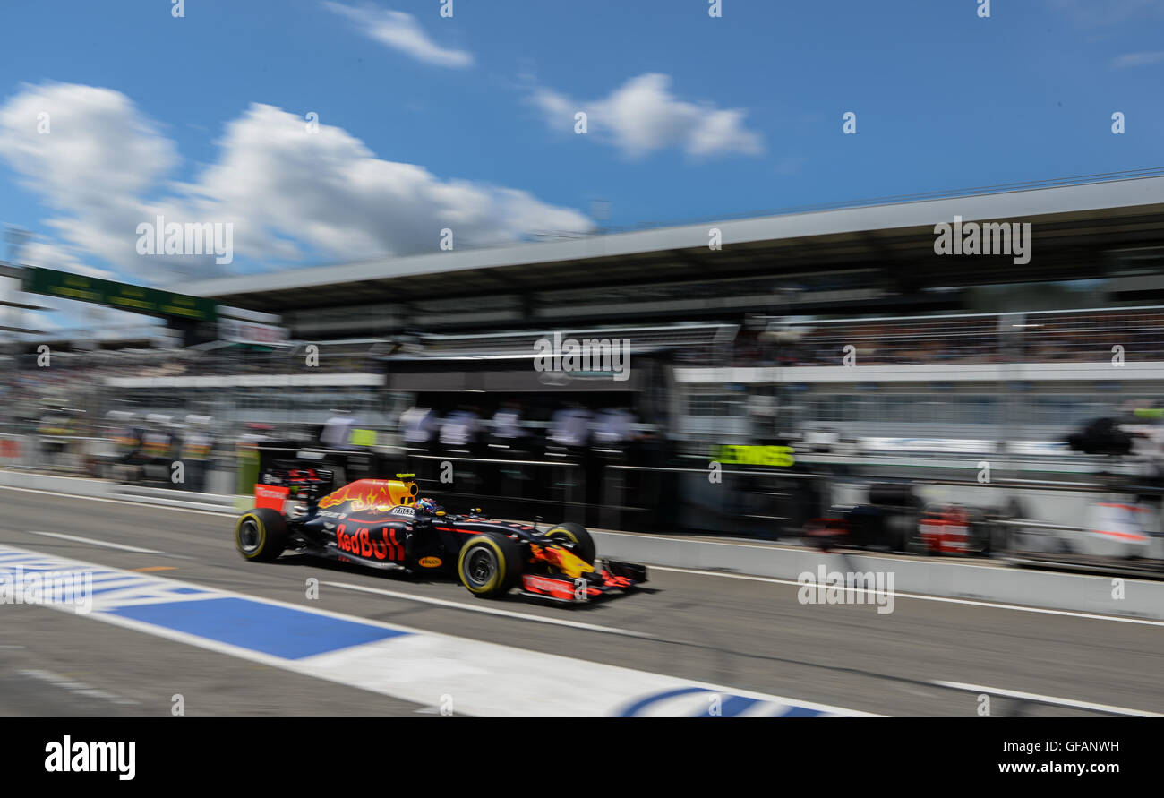Hockenheim, Germany. 30th July, 2016. Dutch Formula 1 racer Max Verstappen from Red Bull Racing arrives to the box during the 3rd open training on the Hockenheimring in Hockenheim, Germany, 30 July 2016. The German Grand Prix takes place on 31 July 2016. Photo: WOLFRAM KASTL/dpa/Alamy Live News Stock Photo