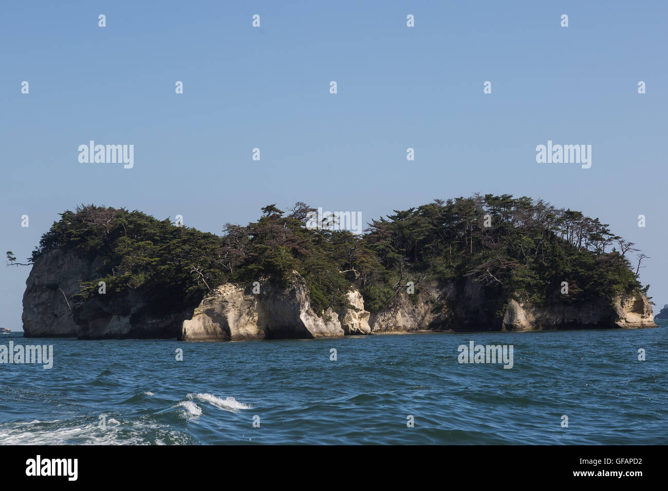 A general view of Matsushima Bay seen from a boat as part of the ''1000km Relay to Tokyo 2016'' promotion event in Matsushima on July 30, 2016, Miyagi, Japan. There are about 260 small islands in the bay, whose name means Pine Islands. At the time of the March 2011 earthquake and tsunami the islands served as a natural barrier weakening the impact of the tsunami on the coastal town. Matsushima is one of the most popular spots to visit for tourists in the region. © Rodrigo Reyes Marin/AFLO/Alamy Live News Stock Photo
