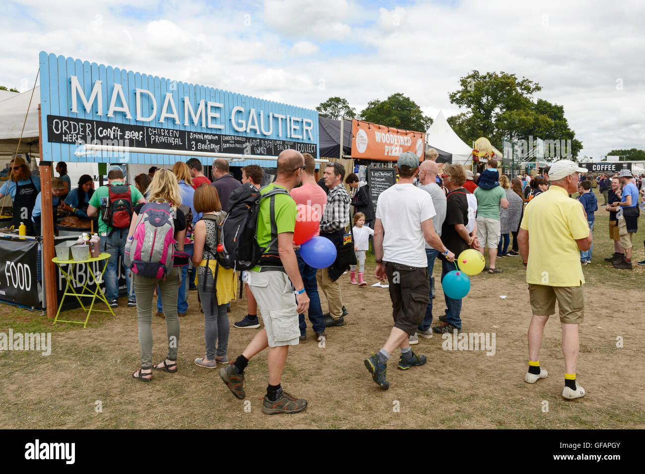 Carfest North, Bolesworth, Cheshire, UK. 30th July 2016. People queueing at one of the many food stalls. The event is the brainchild of Chris Evans and features 3 days of cars, music and entertainment with profits being donated to the charity Children in Need. Andrew Paterson/Alamy Live News Stock Photo