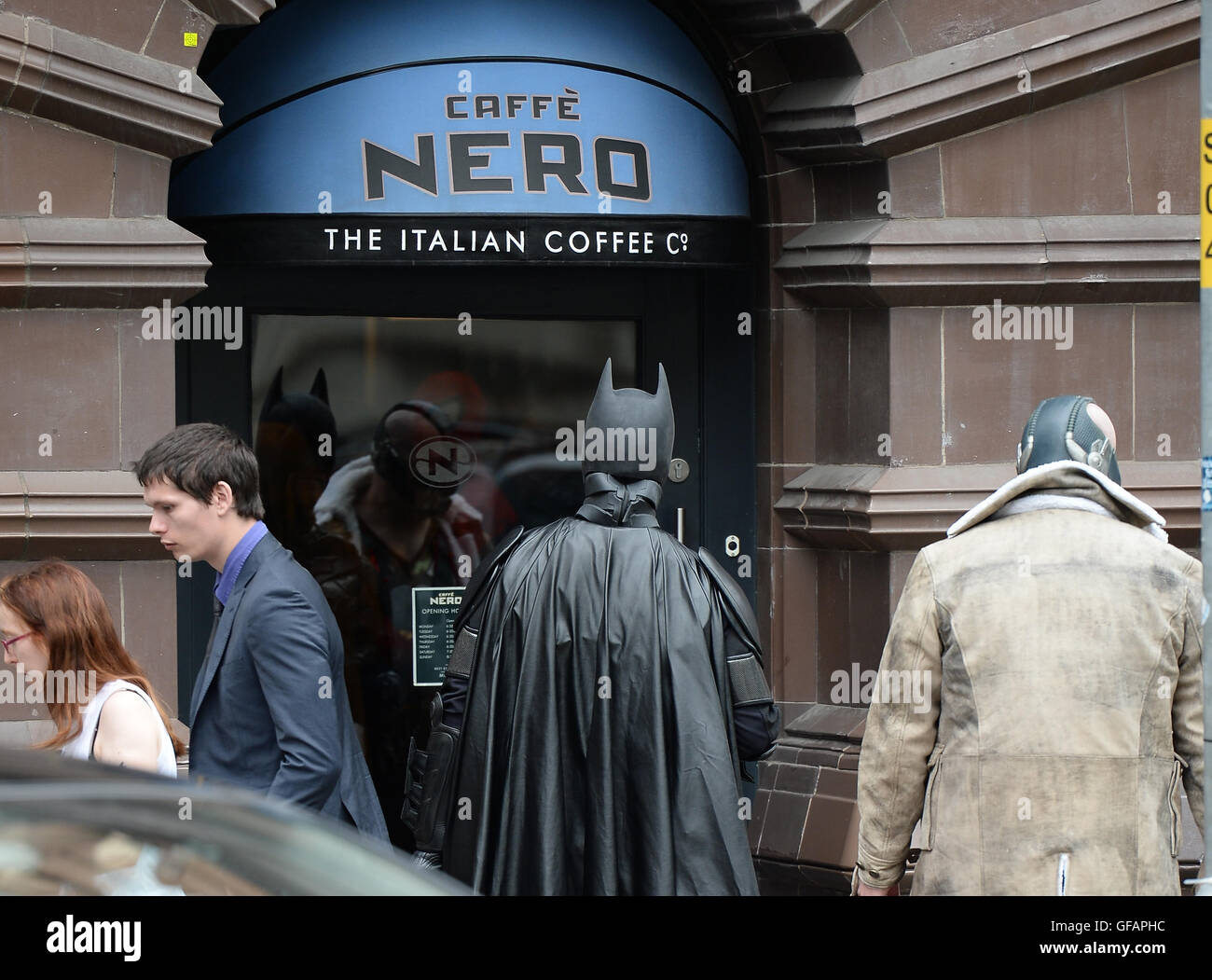 Manchester, UK. 30th July, 2016. Batman stops off at Cafe Nero in Manchester City Centre, Saturday, 30, July Manchester, United Kingdom. Credit:  Stephen Searle/Alamy Live News Stock Photo