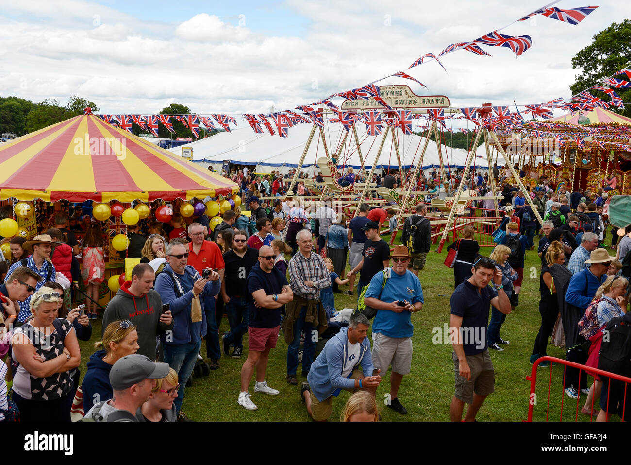 Carfest North, Bolesworth, Cheshire, UK. 30th July 2016. The fairground area of the festival. The event is the brainchild of Chris Evans and features 3 days of cars, music and entertainment with profits being donated to the charity Children in Need. Andrew Paterson/Alamy Live News Stock Photo