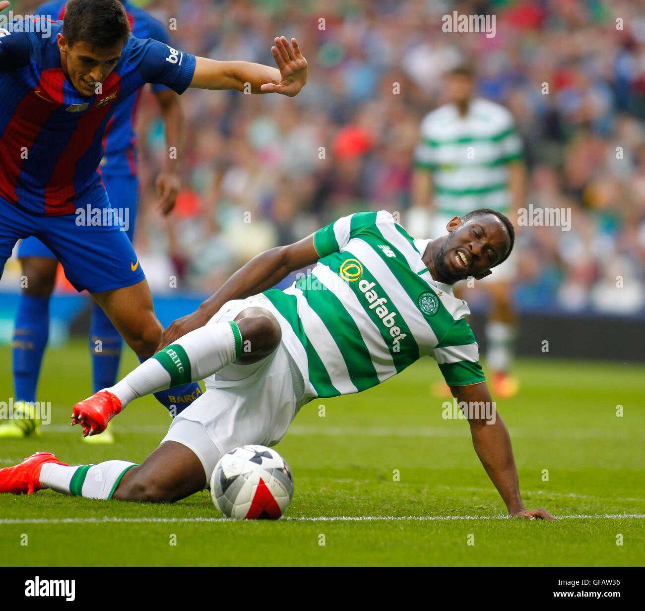 Aviva Stadium, Dublin, Ireland. 30th July, 2016. International Champions Cup Football. Barcelona versus Celtic. Moussa Dembele slides in to keep possession for Celtic. Credit:  Action Plus Sports/Alamy Live News Stock Photo