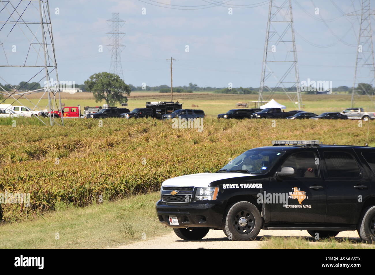 (160731) -- LOCKHART, July 31, 2016 (Xinhua) -- Local police seal off the site of a balloon crash accident near Lockhart, a city in the central part of the U.S. state of Texas, July 30, 2016. U.S. Texas Department of PUBLIC Safety has confirmed that 16 people were killed on Saturday morning after a hot air balloon caught on fire and crashed near Lockhart. The accident occurred shortly after 7:40 a.m. local time on Saturday near Lockhart, when the hot air balloon with at least 16 people on board crashed into a pasture, the Federal Aviation Administration (FAA) said in a statement on Saturday. ( Stock Photo