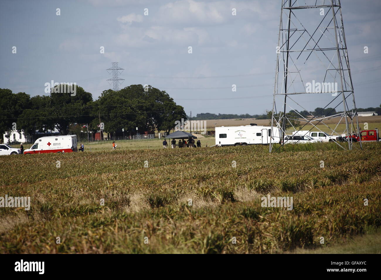 (160731) -- LOCKHART, July 31, 2016 (Xinhua) -- Investigators work at the site of a balloon crash accident near Lockhart, a city in the central part of the U.S. state of Texas, July 30, 2016. U.S. Texas Department of PUBLIC Safety has confirmed that 16 people were killed on Saturday morning after a hot air balloon caught on fire and crashed near Lockhart. The accident occurred shortly after 7:40 a.m. local time on Saturday near Lockhart, when the hot air balloon with at least 16 people on board crashed into a pasture, the Federal Aviation Administration (FAA) said in a statement on Saturday. ( Stock Photo