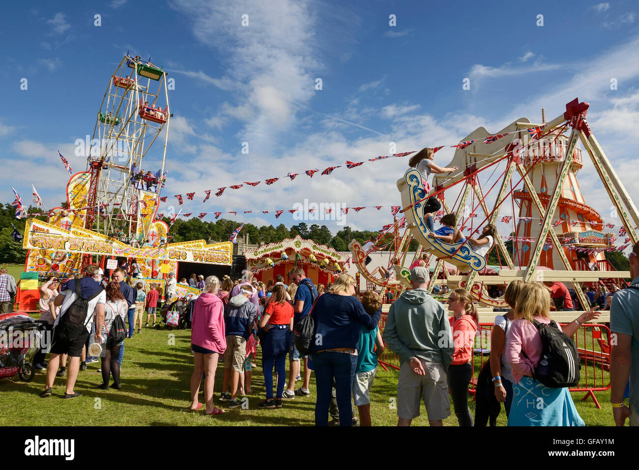 Carfest North, Bolesworth, Cheshire, UK. 30th July 2016. People enjoying the fairground rides. The event is the brainchild of Chris Evans and features 3 days of cars, music and entertainment with profits being donated to the charity Children in Need. Andrew Paterson/Alamy Live News Stock Photo