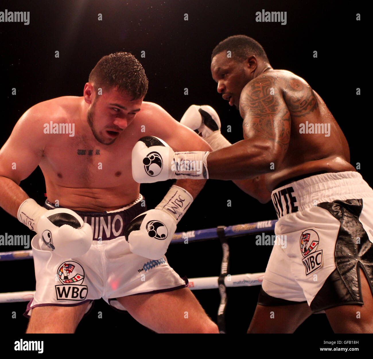 First Direct Arena, Leeds , UK 30th July 2016. Leeds Rumble Matchroom Boxing Fight Night.  Dillian Whyte (Brixton) (White & Black Shorts ) vs Dave Allen (Coinisbrough)(White Shorts with Purple Trim) during their WBC International Heavyweight Championship bout at First Direct Arena, Leeds  Credit: Stephen Gaunt/Touchlinepics.com/Alamy Live News Stock Photo