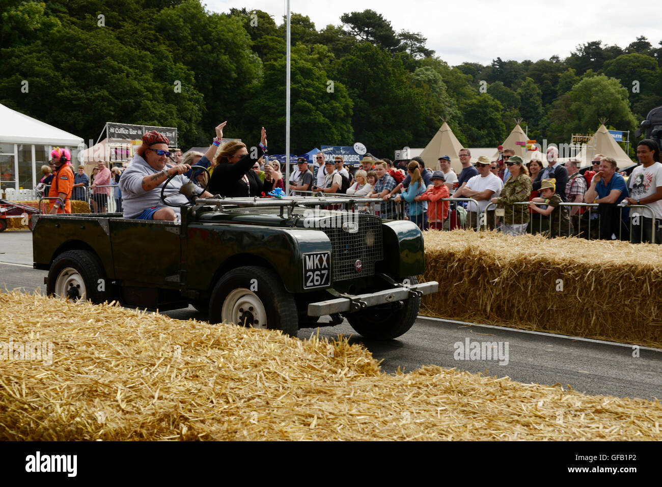 Carfest North, Bolesworth, Cheshire, UK. 31st July 2016. A Mark one Landrover starts a lap of the track. The vehicle has a top speed of 88 miles per hour. The event is the brainchild of Chris Evans and features 3 days of cars, music and entertainment with profits being donated to the charity Children in Need. Andrew Paterson/Alamy Live News Stock Photo