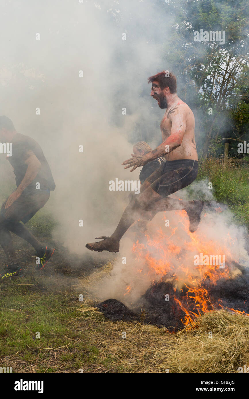 Tough Guy Nettle Warrior 2016 competitor, near Wolverhampton UK at the annual summer obstacle course Stock Photo