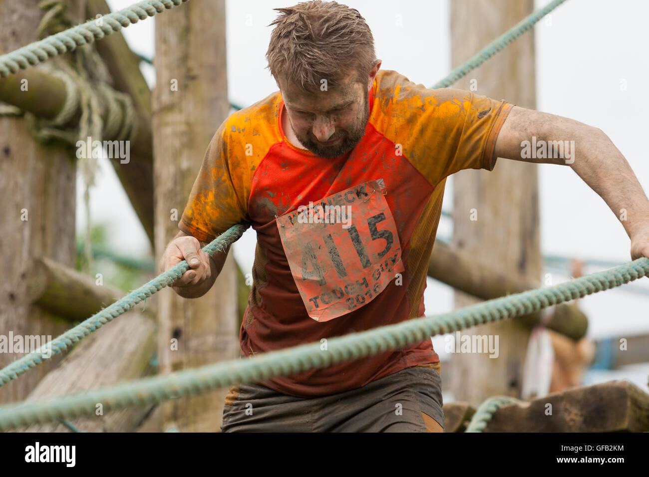 Tough Guy Nettle Warrior 2016 competitor, near Wolverhampton UK at the annual summer obstacle course Stock Photo