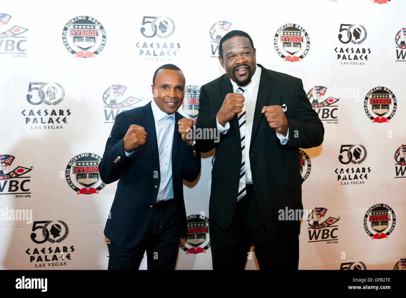 Caesars Palace, Las Vegas, Nevada, USA. 30th July, 2016. Sugar Ray Leonard and Riddick Bowe on the red carpet at the 4th Annual Nevada Boxing Hall of Fame Induction Ceremony Credit:  Ken Howard/Alamy Live News Stock Photo