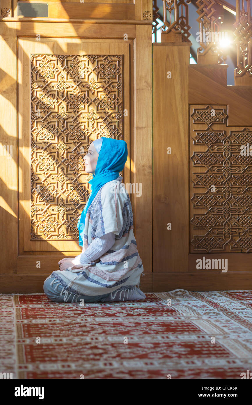 young muslim woman praying for Allah, muslim God Stock Photo - Alamy