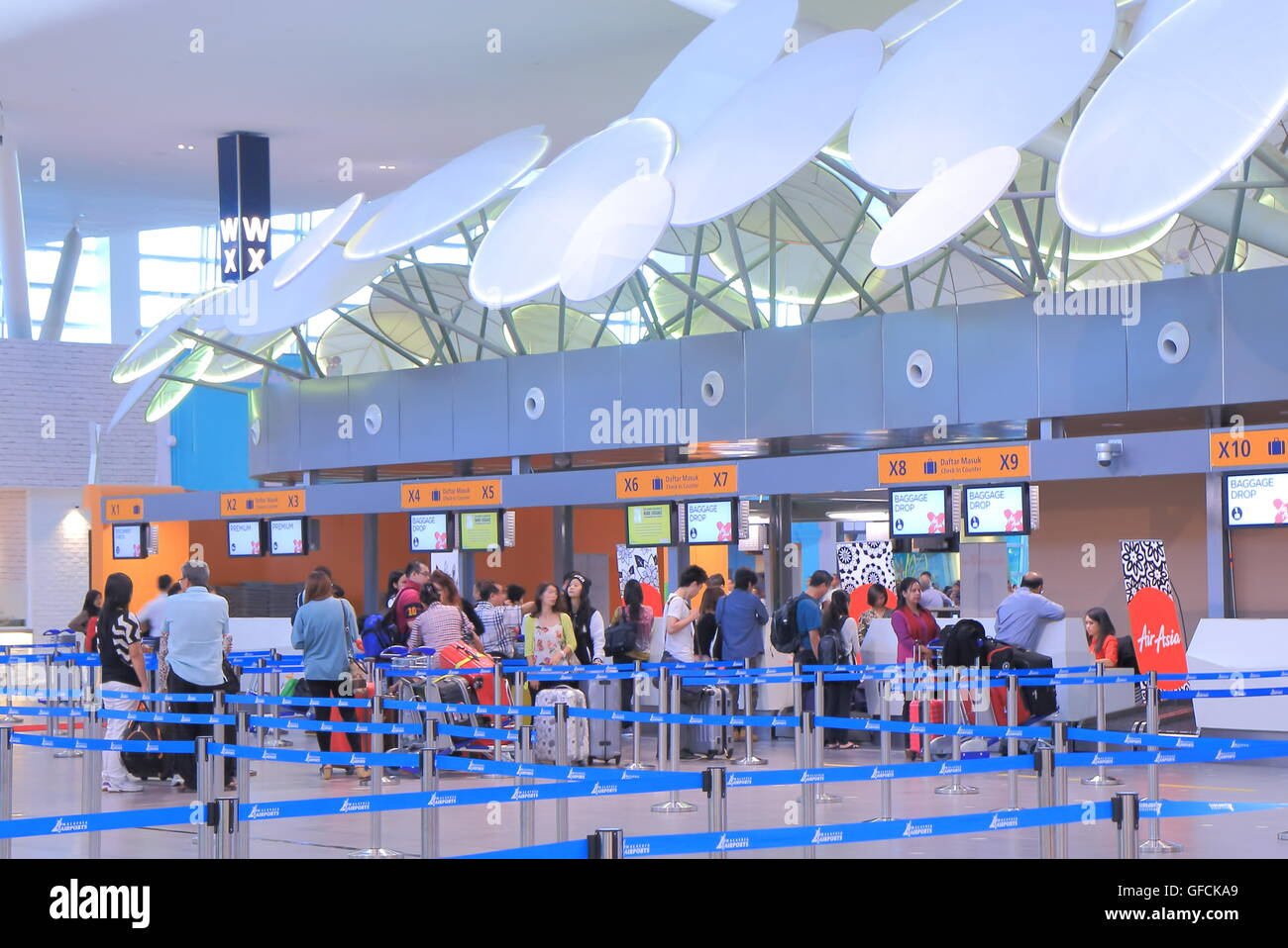 People check in at KLIA 2 Kuala Lumpur airport in Kuala Lumpur Malaysia. Stock Photo