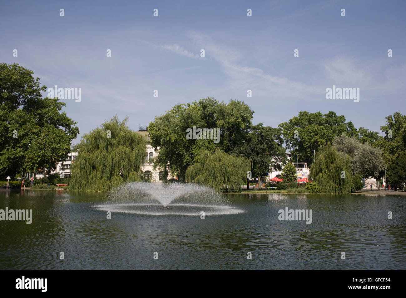 City park lake with fountain Stock Photo - Alamy