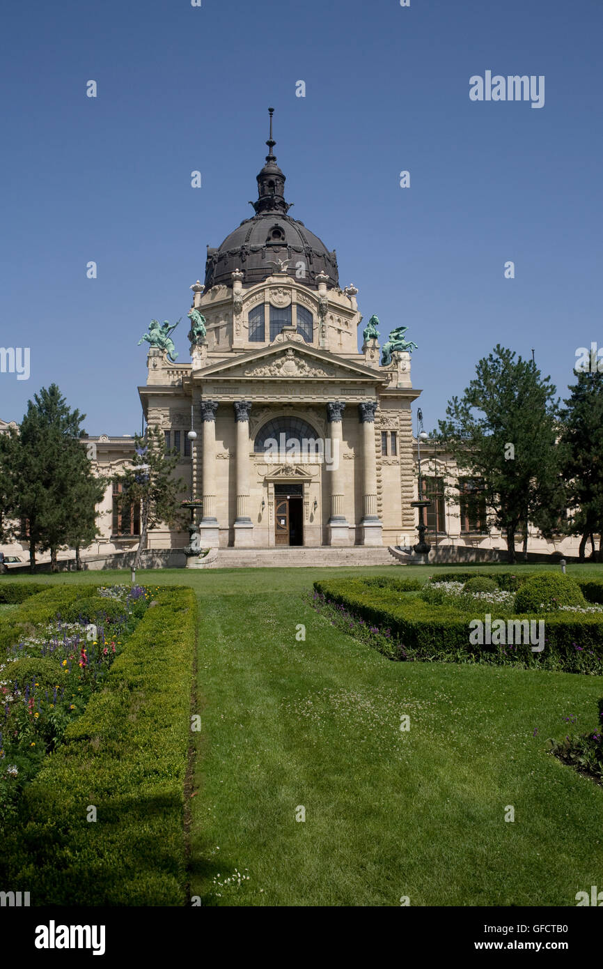 Entrance to Szechenyi baths with formal garden in City park Stock Photo